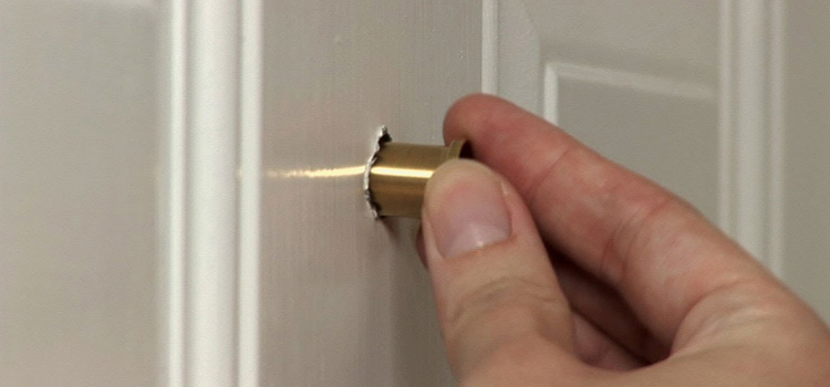 peephole door repair in Compton